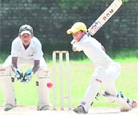 A batsman plays a shot during a match of the Monsoon Cup (U-15) in Chandigarh on Friday