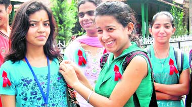 Members of the Red Ribbon Club during the AIDS awareness campaign at the PG college in Dharamsala on Friday.