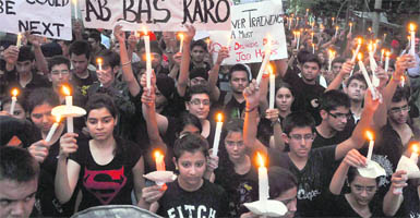 Schoolchildren take out a candlelight march in memory of Akhilesh, who was mowed down by a MC truck in Ludhiana
