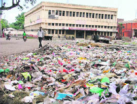 Heaps of garbage is an eyesore for passengers coming to the railway station in Ludhiana. 