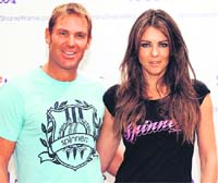 Shane Warnes (L) new diet recommends replacing two meals a day and snacks with liquid supplements 