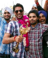 Pardeep Sra, a local lad and the winner of the PTC Voice of Punjab, being welcomed in Bathinda on Saturday.