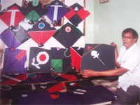 Ayyub Khan, a kite seller in Old Delhi, shows his collection.