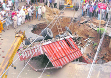 A truck driver was killed when his vehicle tripped into a caved-in portion of the road near Maharaj Nagar in Ludhiana on Saturday.