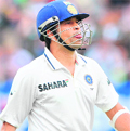 Sachin Tendulkar leaves the field after being run out 