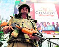 A security personnel guards the Bakshi Stadium, the main venue of the Independence day function, in Srinagar on Saturday