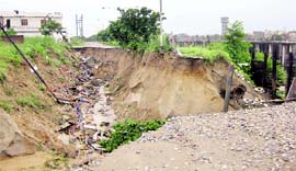 not spared A portion of a road that caved in at Shaheed Bhagat Singh Nagar.
