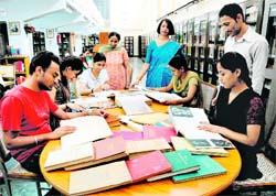 Students read books at the library of Postgraduate Government College, Sector 11, Chandigarh