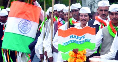 Members of the Nehru Brigade celebrate Independence Day near Rajghat in New Delhi on Sunday.