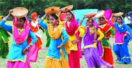 Schoolchildren present a colourful programme in Bathinda on Independence Day.