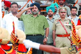 Deputy Chief Minister Sukhbir Singh Badal takes the salute at the march past held at Fazilka on Independence Day.