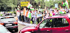 Supporters of Anna Hazare protest at the roundabout of Sectors 7, 8, 18 and 19 in Chandigarh on Tuesday