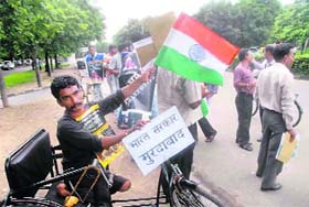 Akram, who is on a wheelchair, is supporting the cause