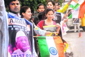 Supporters of Anna Hazare protest near the Sector 7-8 roundabout in Chandigarh on Tuesday
