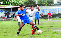 Players in action in the Lala Nemi Dass Memorial District Football League in Dehradun on Tuesday. 
