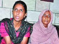 Chanderpati (right) and her daughter, Seema, sister of Manoj, address mediapersons in Karnal