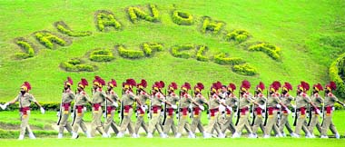 Punjab Police jawans march past during the Independence Day function in Jalandhar on Monday.