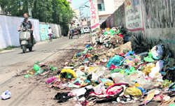 Garbage thrown in the open is a eyesore for the residents.