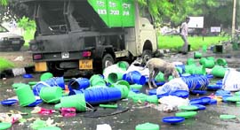 A view of the garbage bins thrown on roads by protesters at Sarabha Nagar in Ludhiana.