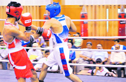 Akhil Kumar (R) and Shiva Thapa during the trials at NIS in Patiala on Tuesday. 