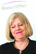 British Home Secretary Theresa May delivers a speech on the need for police reforms in London 