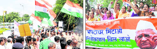 Supporters of Anna Hazare take out a procession at the Tribune Chowk; and (right) BJP activists protest at Phase V in Mohali on Wednesday. Tribune photos: Manoj Mahajan and Vicky Gharu