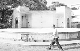 A man walks past the neglected open-air theatre at the Silvi Park in Phase 10 of Mohali on Wednesday. 