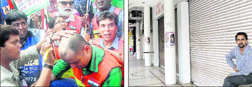 A supporter of Anna Hazare gets his head shaved off at the Sector 7-8 roundabout in Chandigarh; and (right) shopkeepers down their shutters in Panchkula on Wednesday. Tribune photos: Vinay malik and Nitin Mittal 