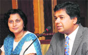 Dr Rajendra Shetty and Dr Prachi Shetty, directors of Children's Hospital, giving details of the 'Toy drive-2011' in Chandigarh on Wednesday. 