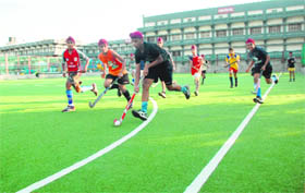 Players practise on the new AstroTurf hockey field at Shivalik Public School, Phase VI, Mohali. 