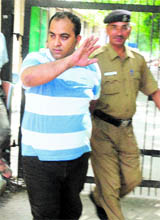Amit Kakkar, director of Healthyway Immigration Consultants, being produced at the district courts in Chandigarh on Wednesday. 