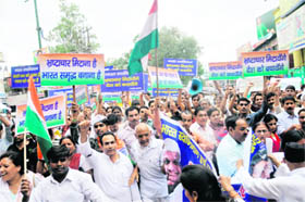Members of the Bharat Swabhiman Manch hold a protest in Dehradun on Wednesday.