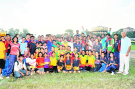 Winners of the Dehradun District Junior and Sub-junior Girls and Boys Handball Championship in Dehradun on Wednesday.