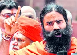Baba Ramdev addresses mediapersons outside Rashtrapati Bhawan in New Delhi on Wednesday