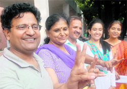 (From left) Prof Akshay Kumar, Navneet Agnihotri, Mohammed Khalid, Kitty Sidhu and Shivani Sharma flash victory signs after their triumph in the PUTA elections at Panjab University, Chandigarh, on Thursday