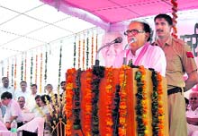 Forest and Environment Minister Capt. Ajay Singh Yadav addresses a gathering at a function in Rewari