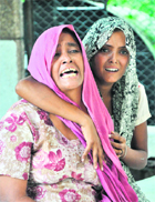 Wailing family members of Sarfu Ram outside GMCH mortuary in Jammu in Thursday. 