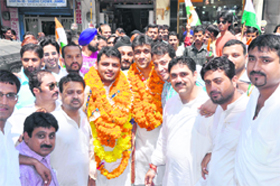 Pranav Shagotra with supporters after being appointed as the general secretary of the Pradesh Youth Congress Committee in Jammu on Thursday.