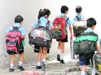 Heavy school bags continue to be a bane for schoolchildren. 