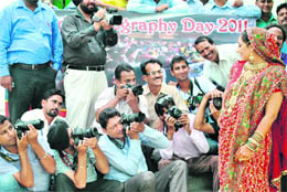 A model poses for the members of the Patiala Photographic Club and Patiala Photographer Association at a workshop organised on the eve of the Wolrd Photography Day, on Thursday. 