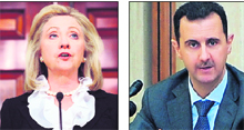 US Secretary of State Hillary Clinton makes a statement to the press on US sanctions on Syria, in Washington on Thursday; and (right) Syrian President Bashar al-Assad addresses a meeting of the central committee of the ruling Baath party in Damascus.