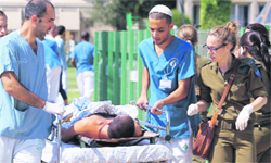 An injured Israeli soldier being taken to a hospital on Thursday. 