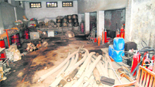In the absence of any proper storage space, fire fighting equipment stored in an unorganised way in the complex.