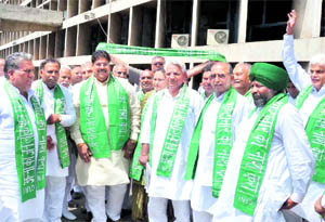Indian National Lok Dal leaders hold protest in support of Anna Hazare at the Haryana Vidhan Sabha in Chandigarh on Friday