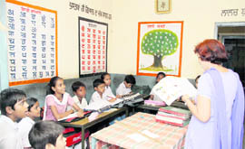 A class comprising only 10 students in progress at the Government Primary School, Kot Amin Khan