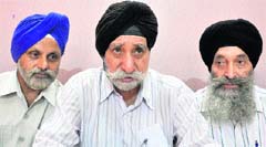 Members of the All-J&K Sikh Intellectual Circle address mediapersons in Jammu