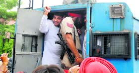 Former Youth Congress president Dinesh Bassi being taken in to judicial custody in Amritsar.