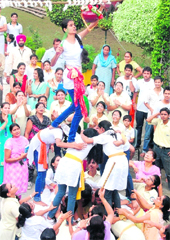  Girls of Shri Ram Asharam School participate in a dahi handi competition during Janamashtami celebrations in Amritsar on Saturday