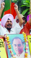 Members of All-India Anti-Terrorist Front pay tributes to Rajiv Gandhi in Amritsar on Friday.