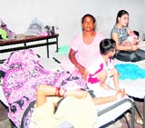 Nursing mothers and new born babies lying on folding beds as the hurriedly introduced Mata Kaushalaya scheme has led to sudden increase in patient load at the Gyneacology Department of the Civil Hospital in Jalandhar.